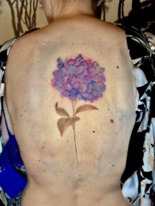Tatouage couleur florale par Marie